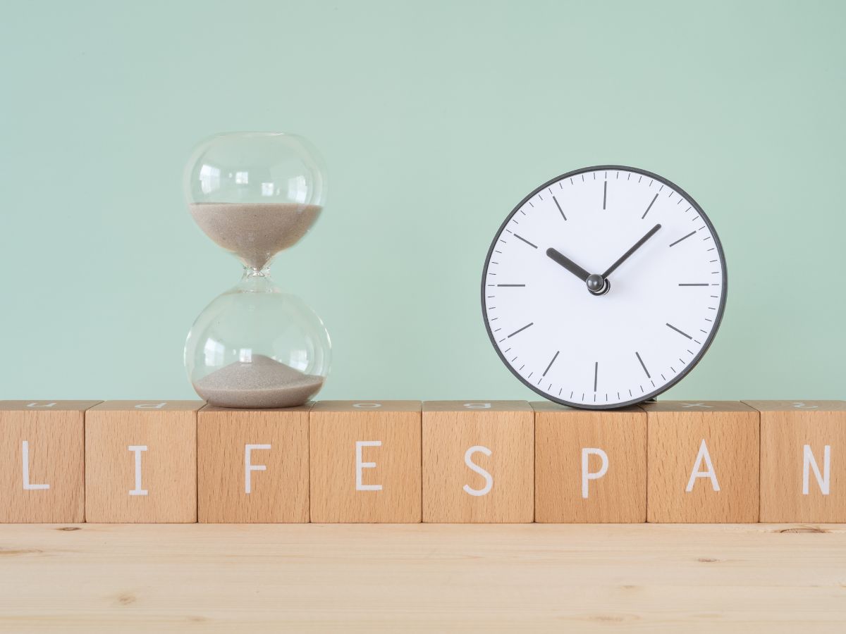 Clock and hourglass showing roof lifespan concept